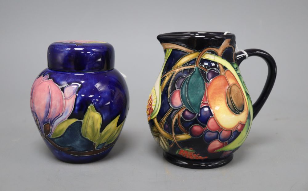 A Moorcroft Queens Choice blue ground bulbous jug and a Hibiscus ginger jar and cover, tallest 12cm